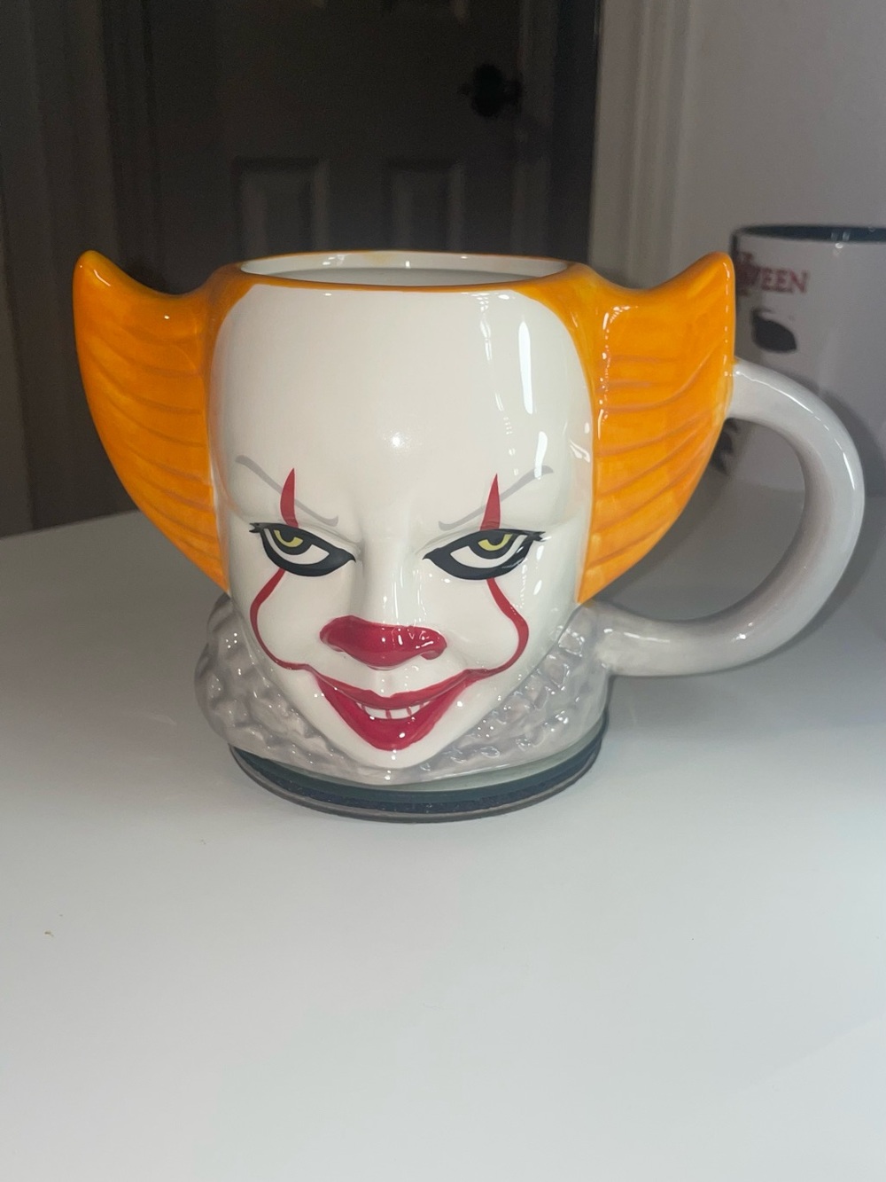 Pennywise Horror Clown Face Ceramic Mug with Orange Hair